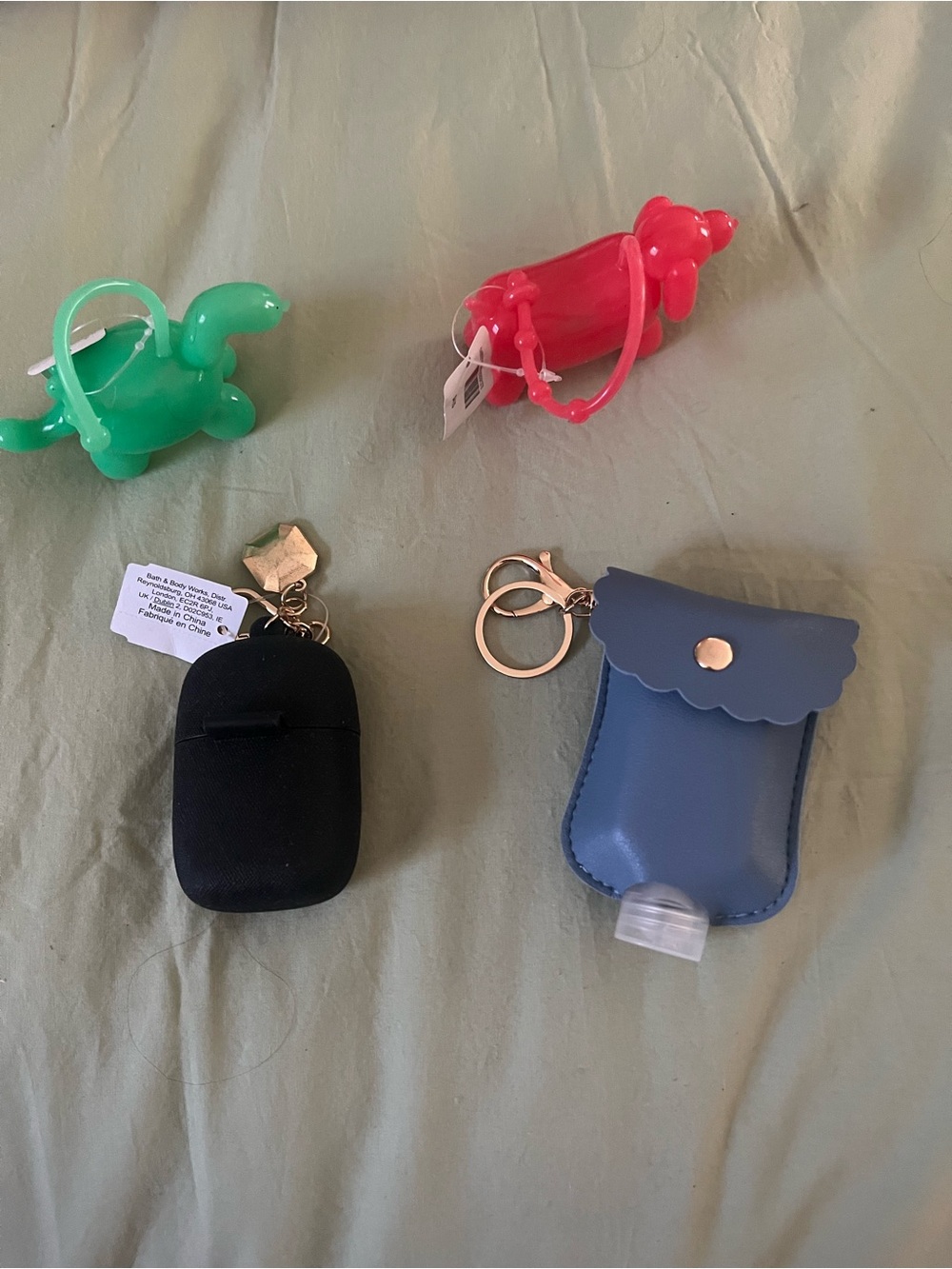 Bath & Body Works Red and Green Dog-Shaped Sanitizer Holders